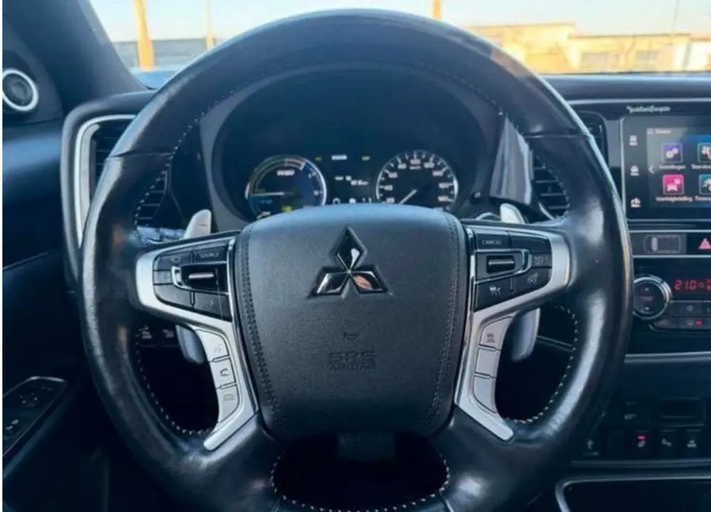 Mitsubishi Outlander 2.4 Hybrid | 4x4 | Trekhaak uit 2019, foto 9