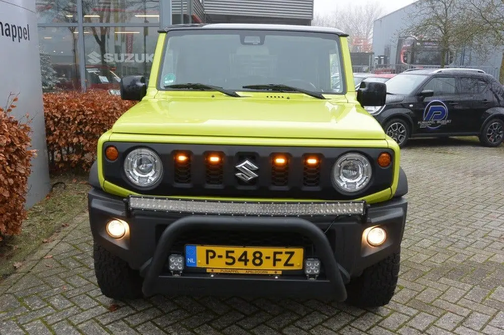 Suzuki Jimny 1.5 Stijl AllGrip (4x4) 4-persoons Navigat uit 2019, foto 2
