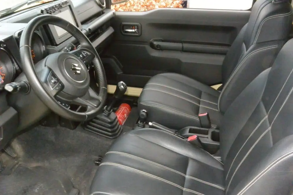 Suzuki Jimny 1.5 Stijl AllGrip (4x4) 4-persoons Navigat uit 2020, foto 17