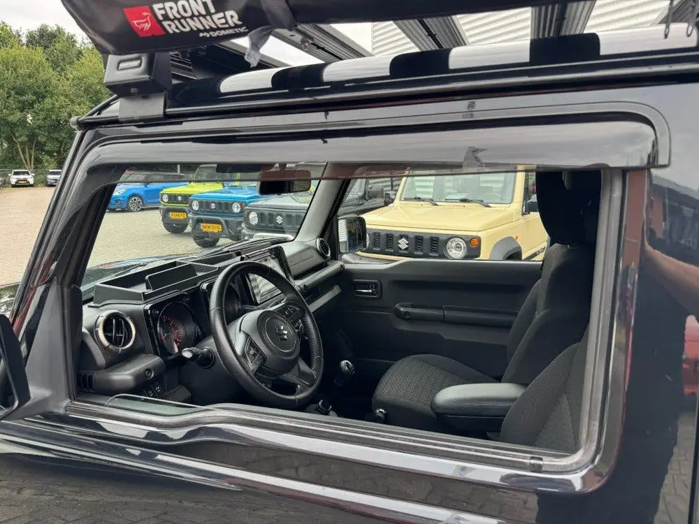 Suzuki Jimny 1.5 Stijl AllGrip (4x4) 4-persoons Navigat uit 2019, foto 13