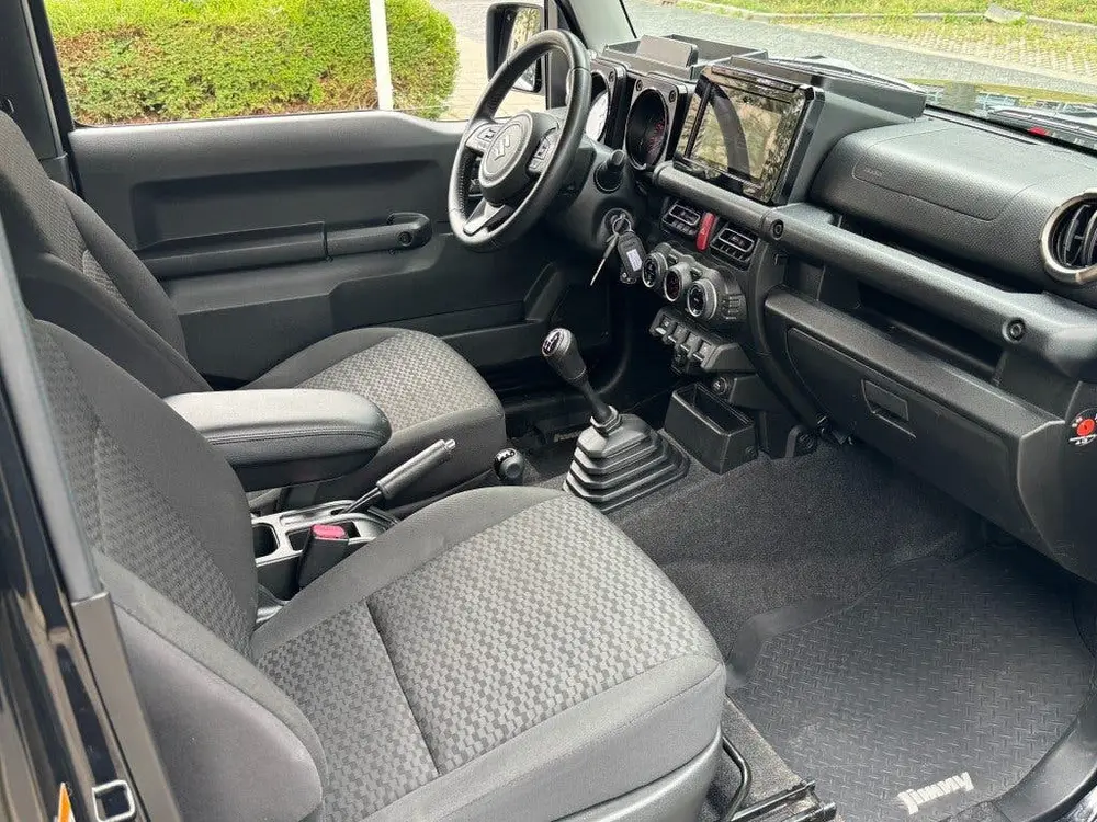 Suzuki Jimny 1.5 Stijl AllGrip (4x4) 4-persoons Navigat uit 2019, foto 3