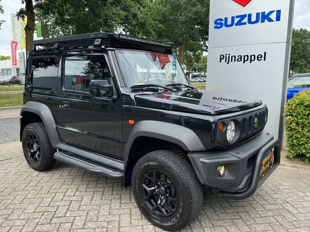 Suzuki Jimny 1.5 Stijl AllGrip (4x4) 4-persoons Navigat uit 2019, foto 9