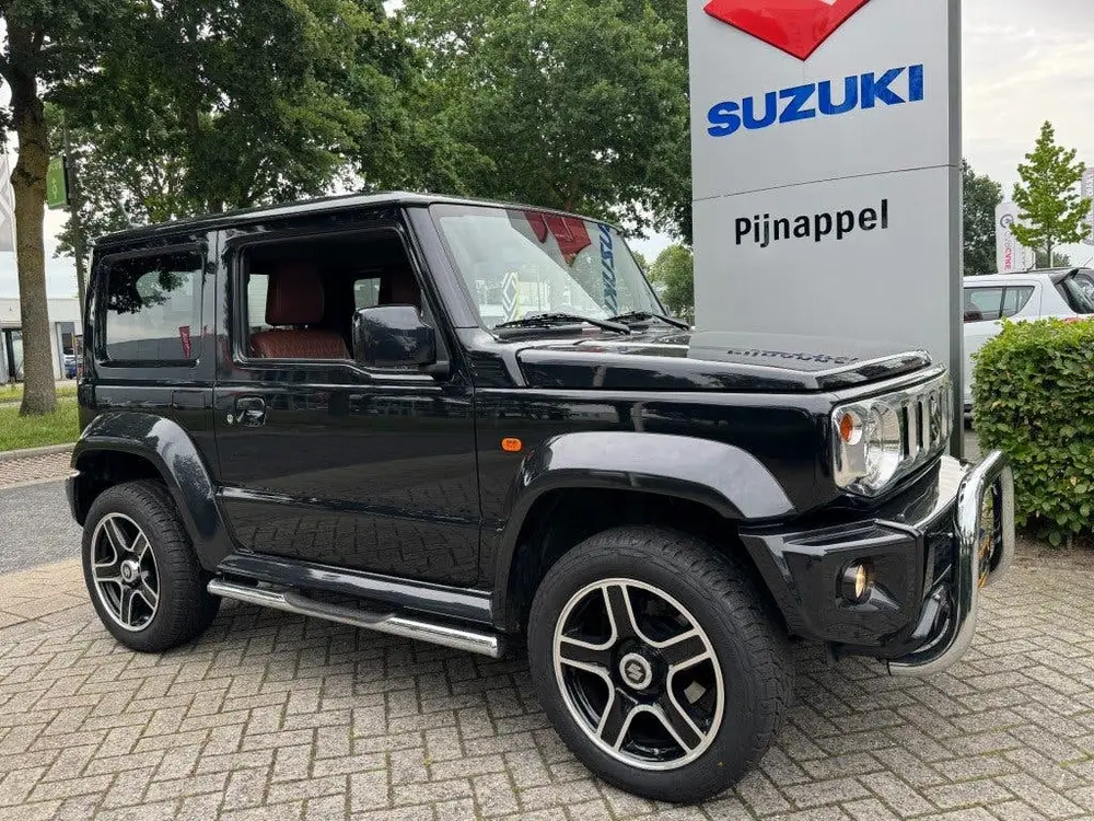 Suzuki Jimny 1.5 Stijl AllGrip (4x4) 4-persoons Navigat uit 2019, foto 11