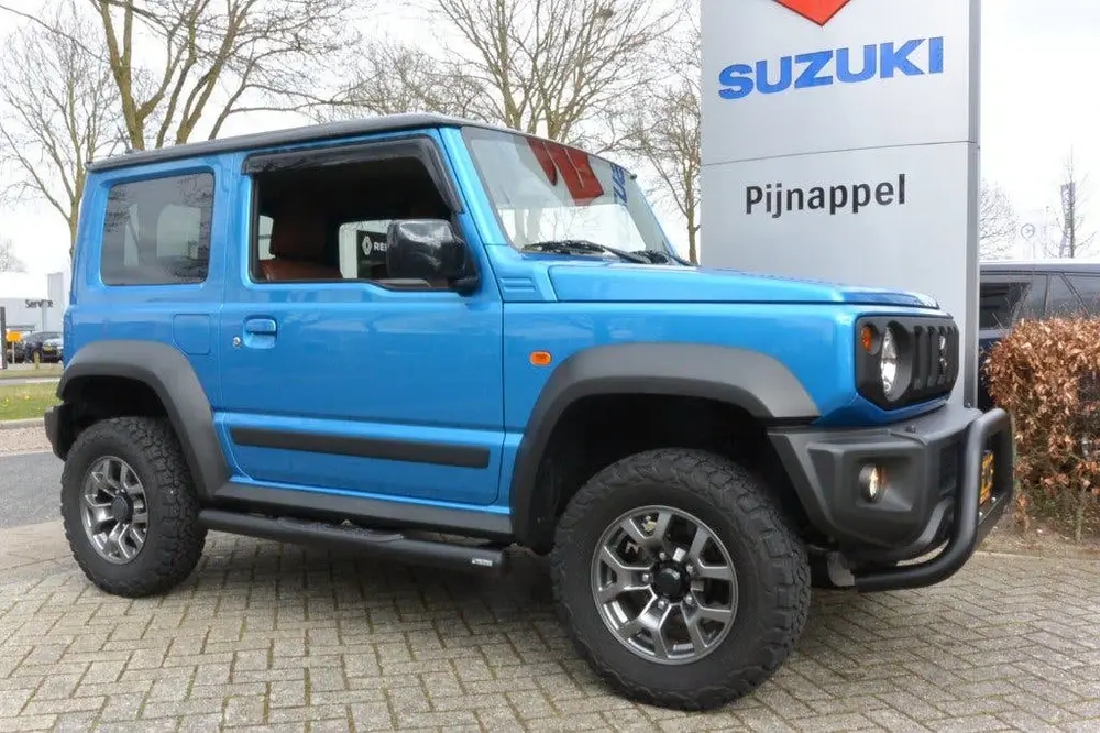 Suzuki Jimny 1.5 Stijl AllGrip (4x4) 4-persoons Navigat uit 2019, foto 11