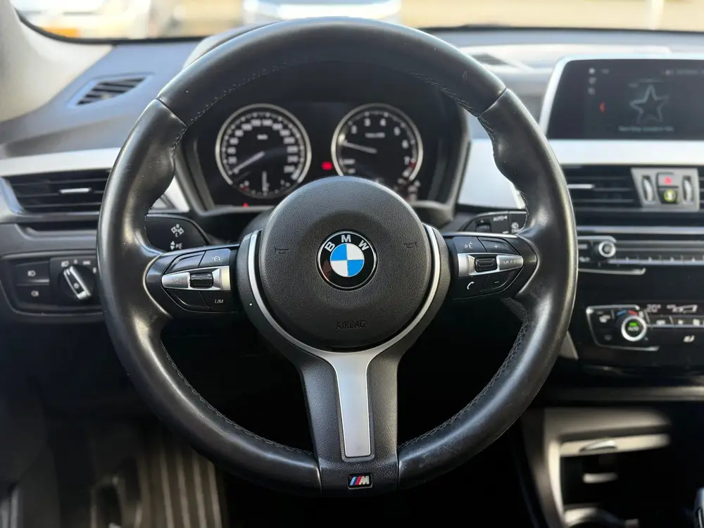 BMW X1 SDrive18i High Executive M-sport uit 2019, foto 17