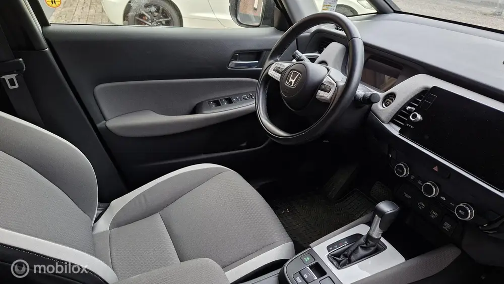 Honda Jazz Hybrid 1.5 i-MMD e-CVT Crosstar 2tone all uit 2021, foto 17