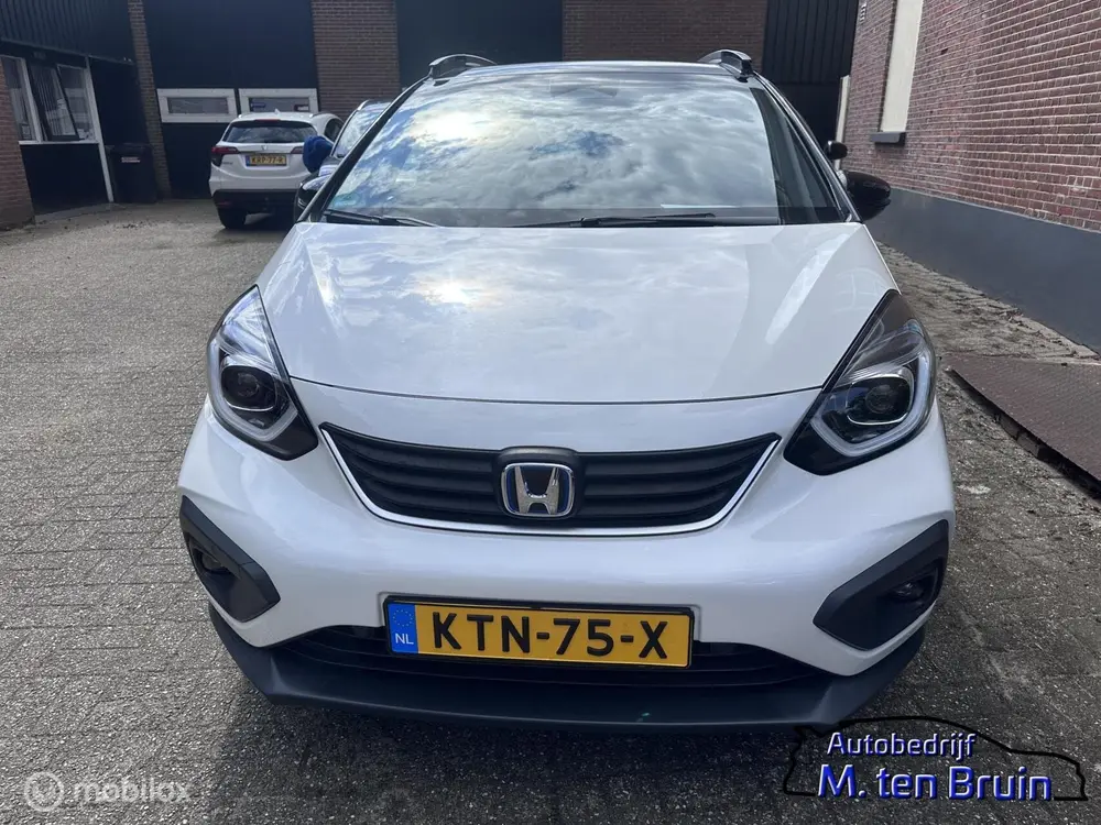 Honda Jazz Hybrid 1.5 i-MMD e-CVT Crosstar 2tone all uit 2021, foto 3