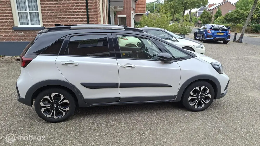 Honda Jazz Hybrid 1.5 i-MMD e-CVT Crosstar 2tone all uit 2021, foto 8