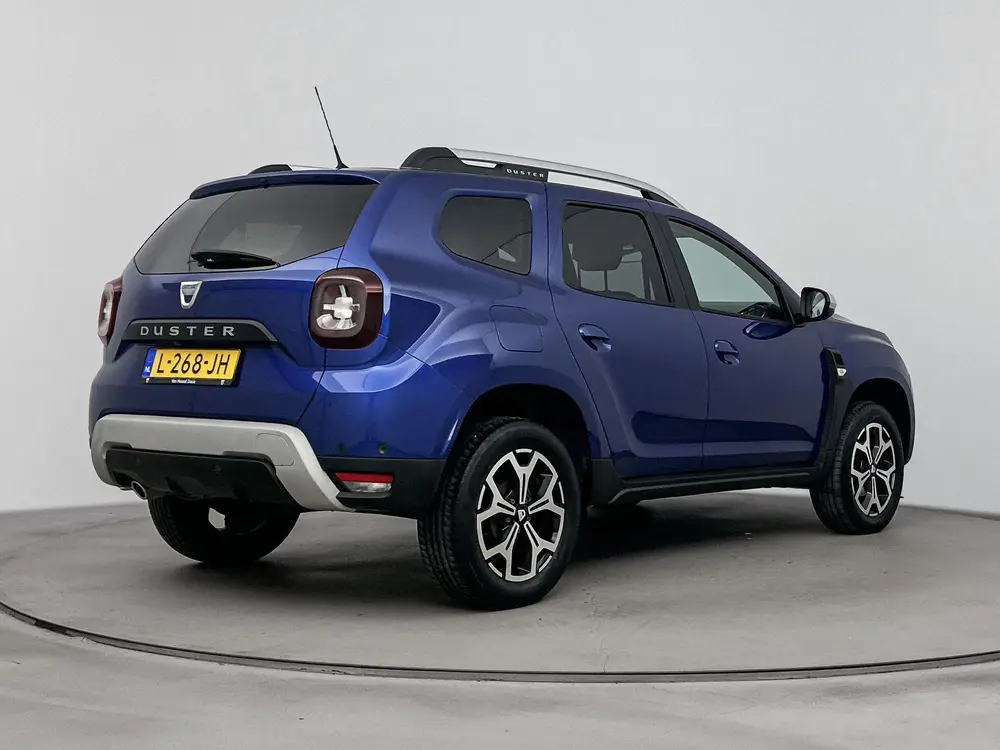 Dacia Duster 1.3 TCe Prestige 130PK | Navigatie | Keyless En uit 2021, foto 4