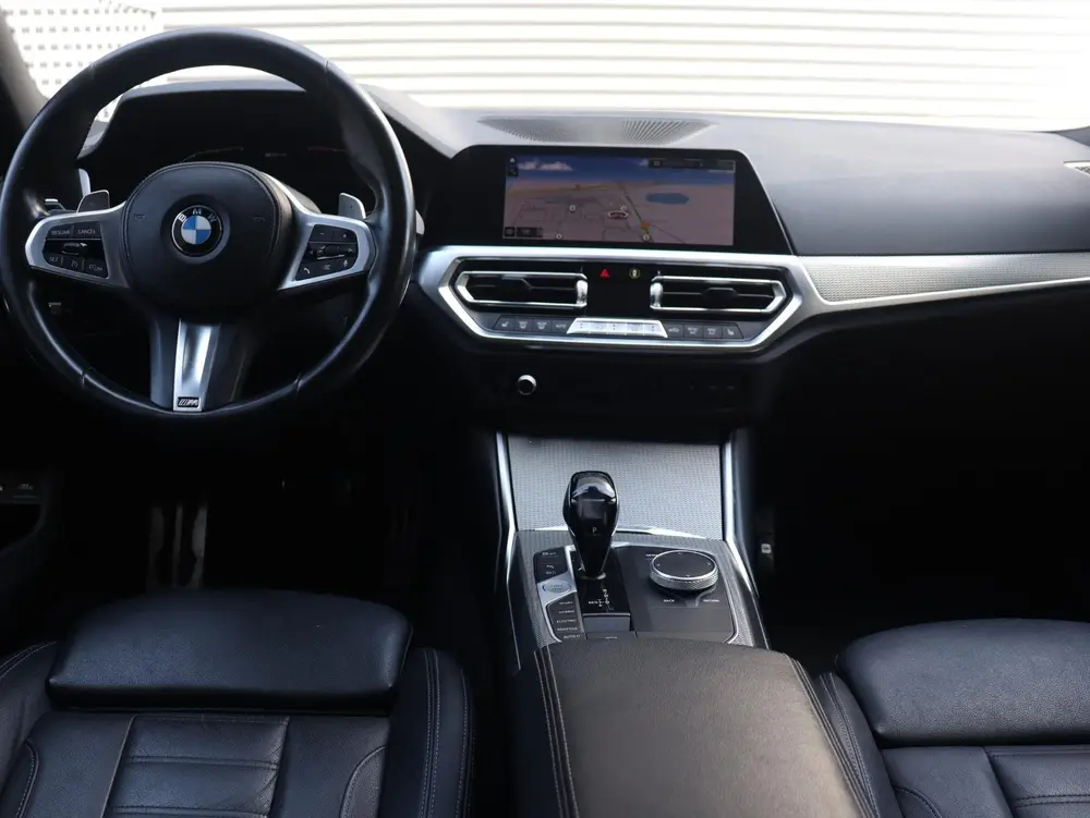 BMW 3-serie Touring 320e uit 2021, foto 12