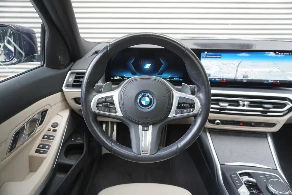 BMW 3-serie Touring 320e uit 2023, foto 7