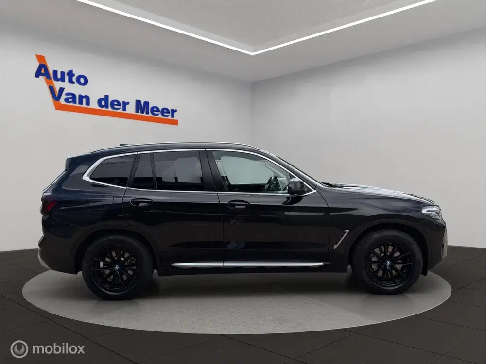 BMW X3 xDrive30e uit 2023, foto 16