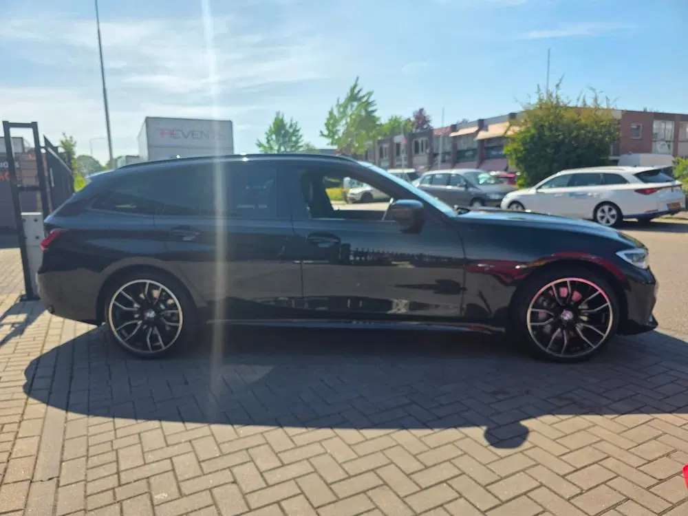 BMW 3-serie 330e High Executive uit 2022, foto 12