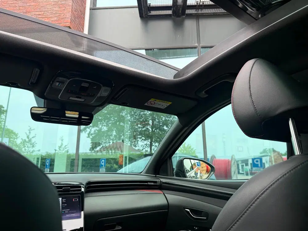Hyundai TUCSON 1.6 T-GDI PHEV N Line Sky 4WD uit 2021, foto 7