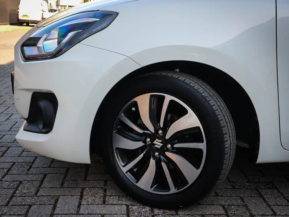 Suzuki Swift 1.2 Stijl | Airco | Navi | Cruise | Stoelverwar uit 2019, foto 16
