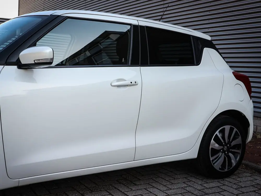 Suzuki Swift 1.2 Stijl | Airco | Navi | Cruise | Stoelverwar uit 2019, foto 17