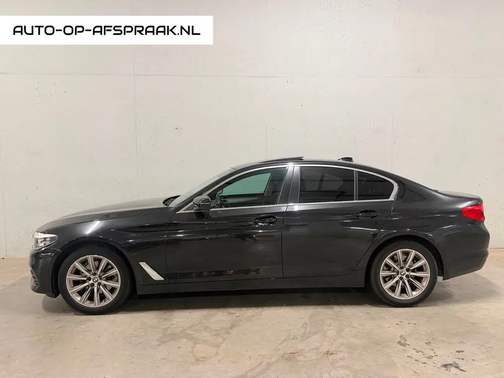 BMW 5-serie 520i Pano Dak Navi Leer Clima Cruise PDC uit 2019
