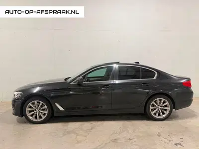 BMW 5-serie 520i Pano Dak Navi Leer Clima Cruise PDC uit 2019
