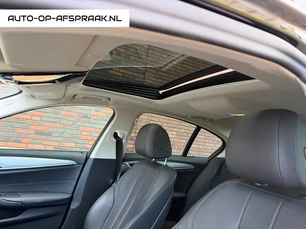 BMW 5-serie 520i Pano Dak Navi Leer Clima Cruise PDC uit 2019, foto 15