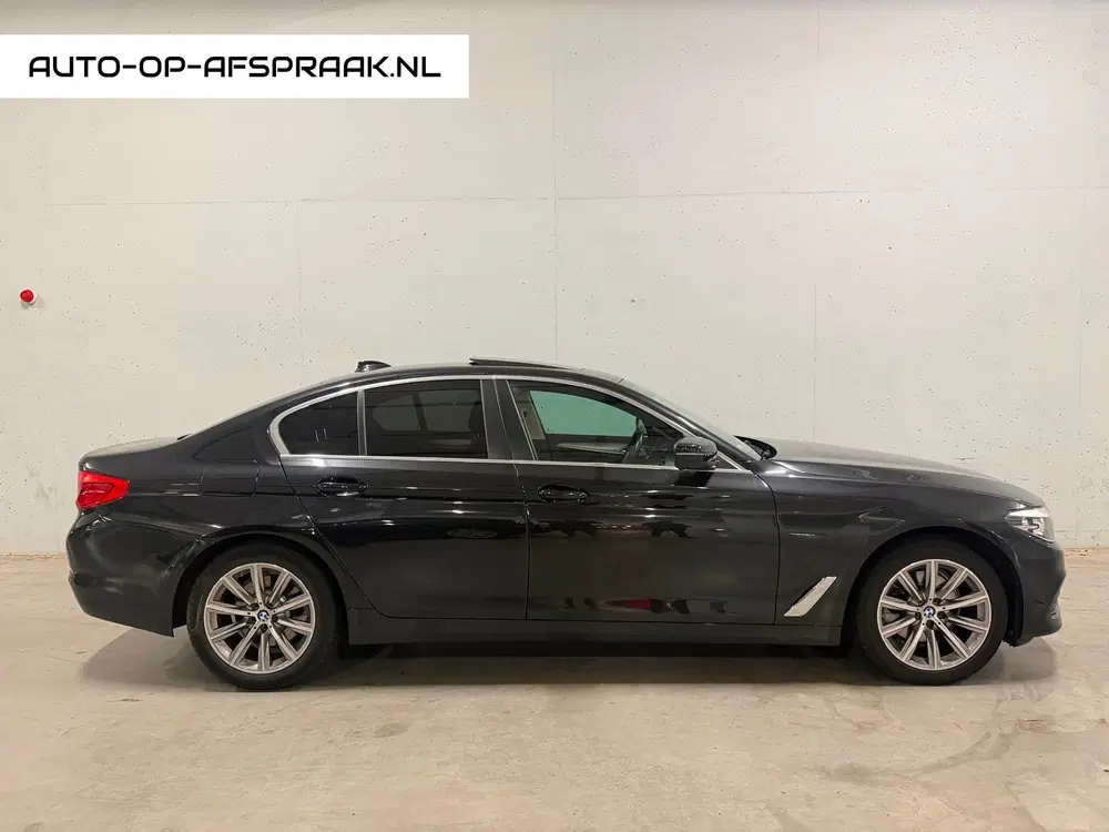 BMW 5-serie 520i Pano Dak Navi Leer Clima Cruise PDC uit 2019, foto 2
