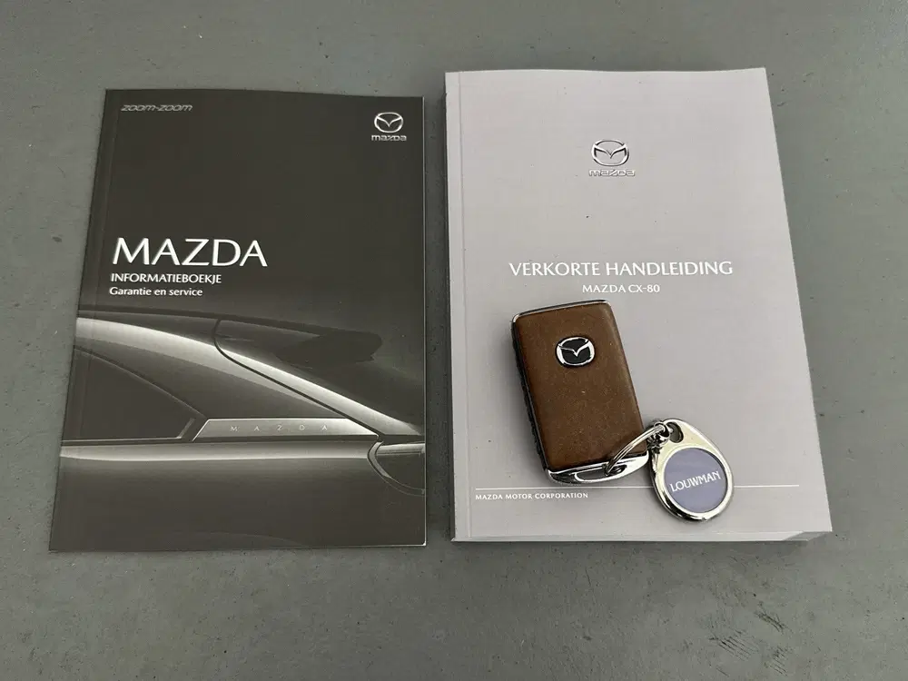 Mazda CX-80 2.5 e-SkyActiv PHEV Homura Plus 6p. uit 2024, foto 16