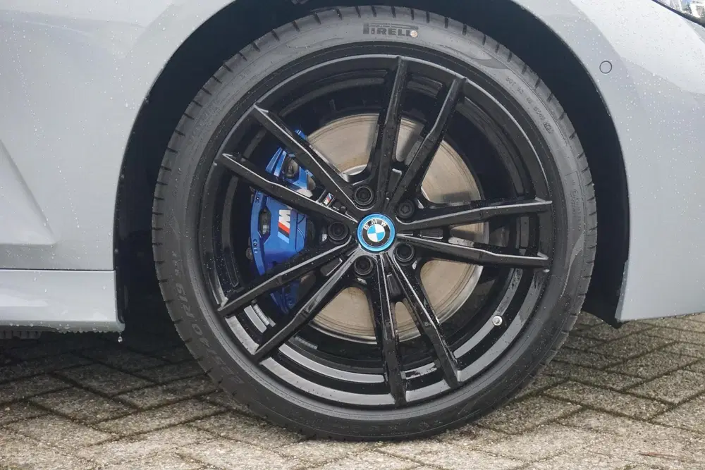BMW 3-serie Touring 320e uit 2024, foto 6