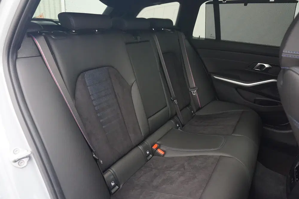 BMW 3-serie Touring 320e uit 2024, foto 8