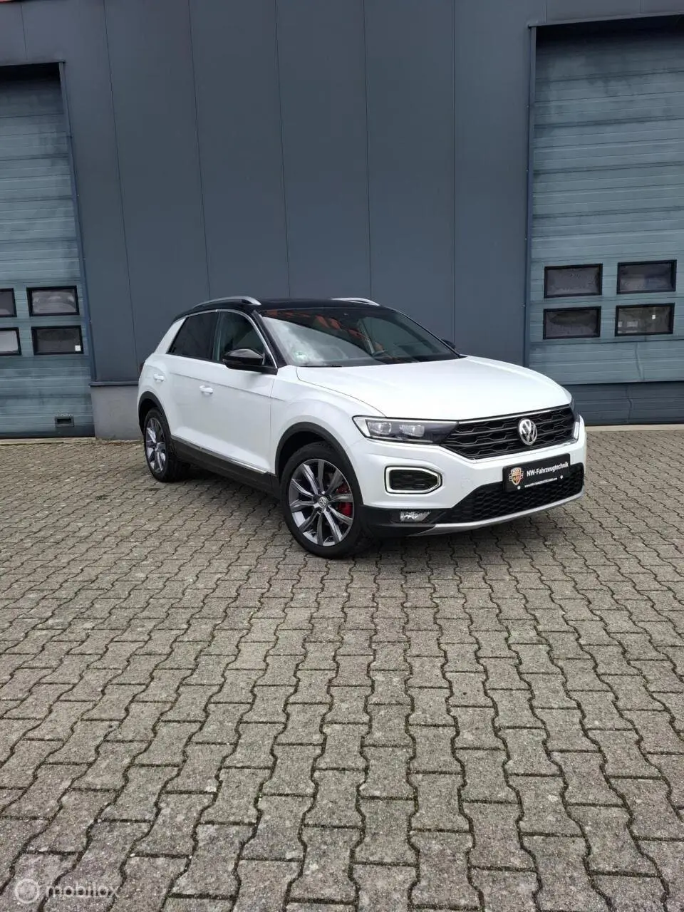 Volkswagen T-Roc 1.5 TSI Sport R 4Motion |Pano|Leder| uit 2019, foto 2