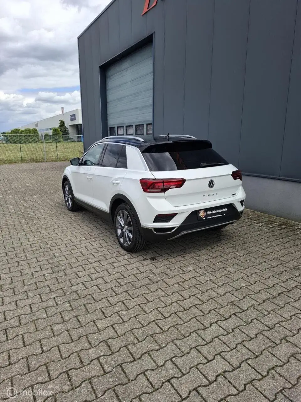 Volkswagen T-Roc 1.5 TSI Sport R 4Motion |Pano|Leder| uit 2019, foto 6