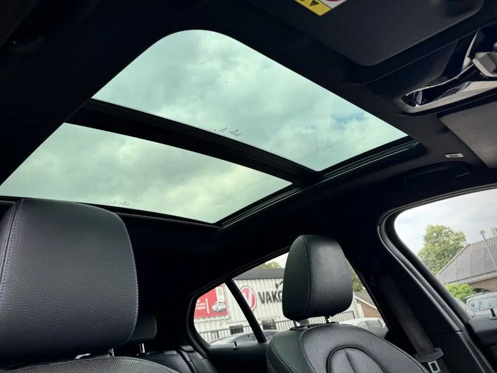 BMW 1-serie M135i xDrive High Executive Pano Head-up K uit 2020, foto 5