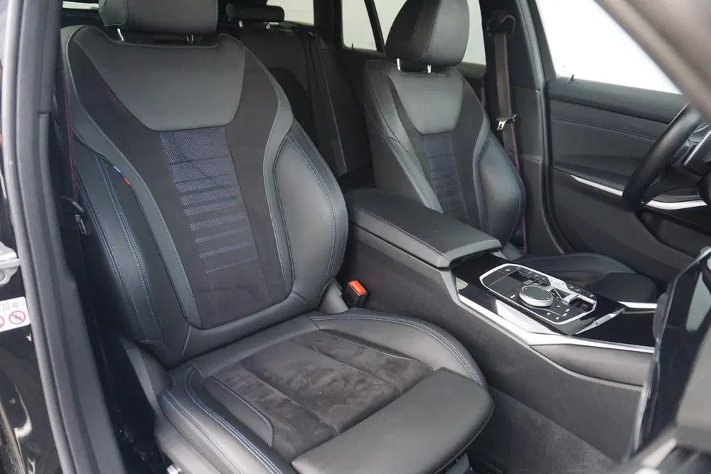 BMW 3-serie Touring 320e M Sportpakket Pro 19'' uit 2022, foto 9