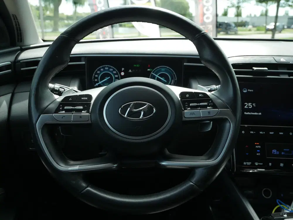 Hyundai TUCSON 1.6 T-GDi HEV 230pk Aut Comfort Smart uit 2021, foto 19