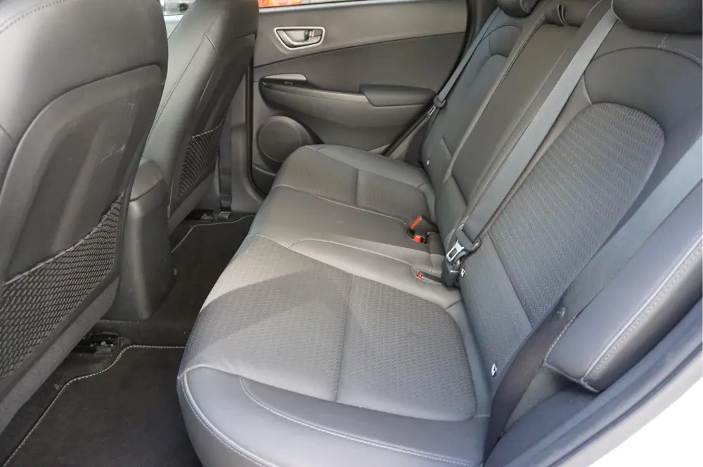 Hyundai Kona EV Premium 64 kWh | SOH 99.2% | Trekhaak | Leer uit 2019, foto 17