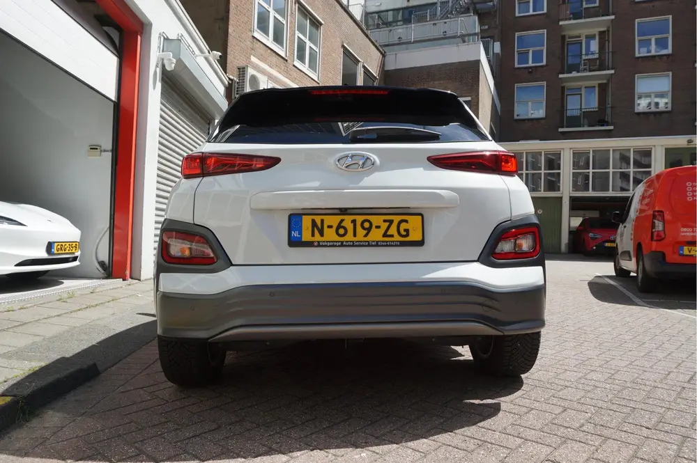 Hyundai Kona EV Premium 64 kWh | SOH 99.2% | Trekhaak | Leer uit 2019, foto 6