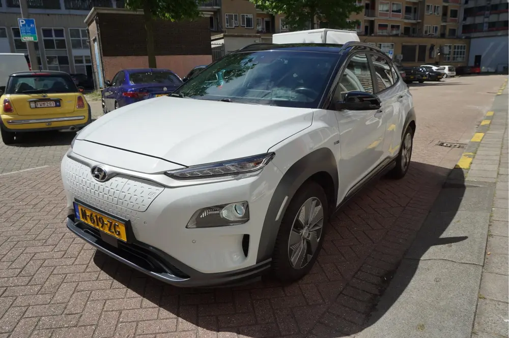 Hyundai Kona EV Premium 64 kWh | SOH 99.2% | Trekhaak | Leer uit 2019, foto 8