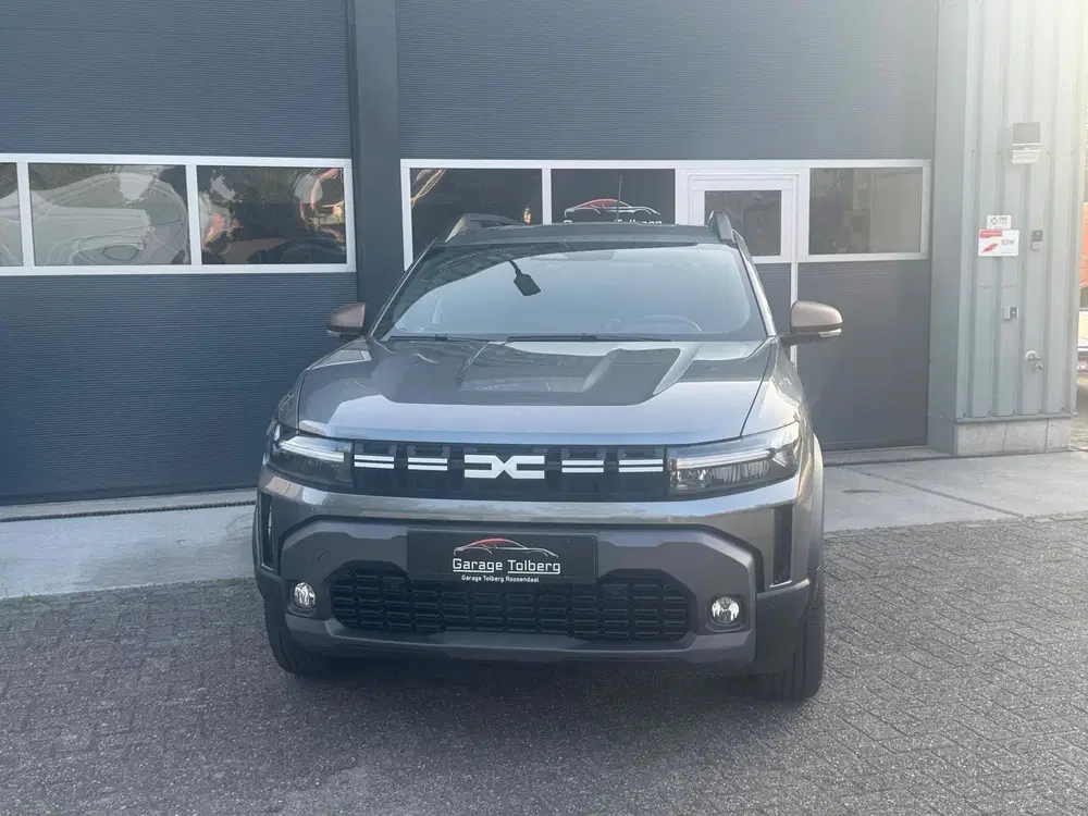 Dacia Duster 1.6 Hybrid 140 Extreme Gris Schiste • 18" uit 2025, foto 18