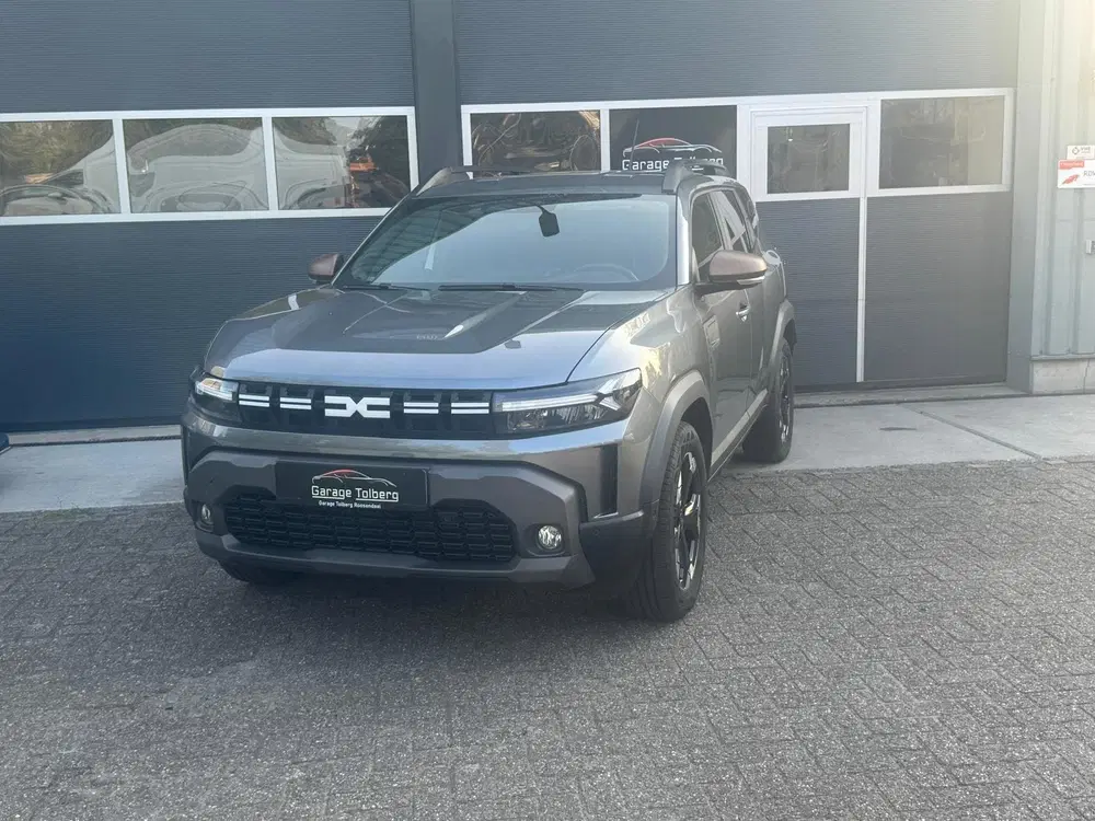 Dacia Duster 1.6 Hybrid 140 Extreme Gris Schiste • 18" uit 2025, foto 19