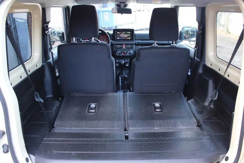 Suzuki Jimny 1.5 Stijl | 4x4 | AllGrip | 4 Persoons | Clima uit 2019, foto 8