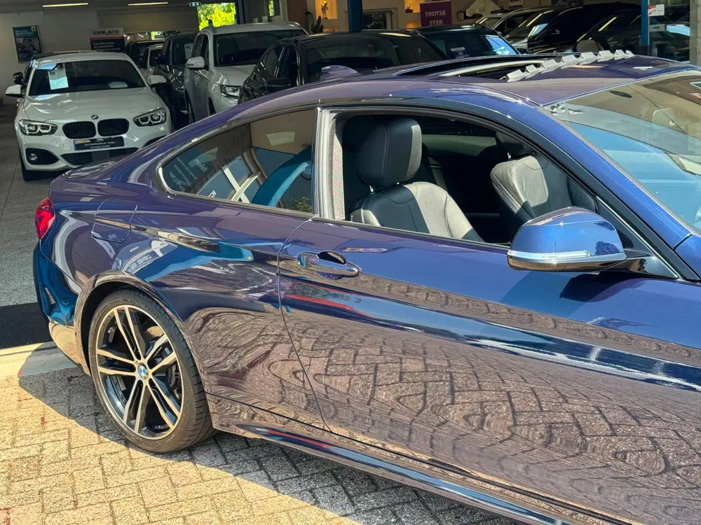 BMW 4-serie 4-serie Coupé 420i High Executive M-Pakket uit 2019, foto 16