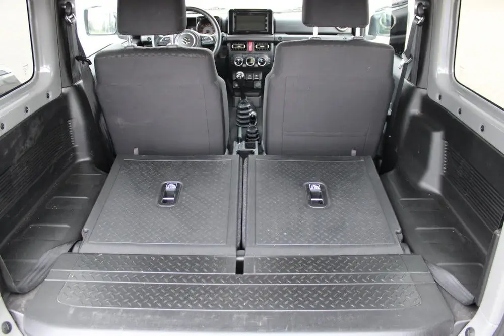 Suzuki Jimny 1.5 Stijl | 4x4 | AllGrip | 4 Persoons | Roofra uit 2019, foto 13