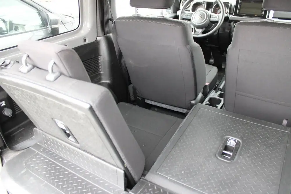 Suzuki Jimny 1.5 Stijl | 4x4 | AllGrip | 4 Persoons | Roofra uit 2019, foto 14