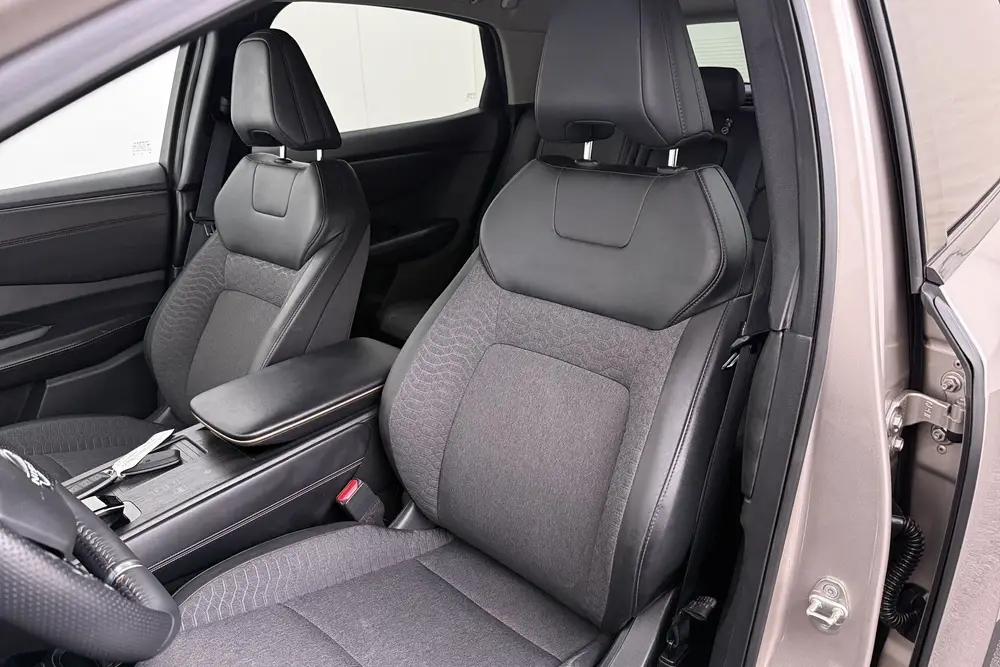 Nissan Ariya Evolve 66 kWh 98%SOH Warmtepomp Half-Leder uit 2023, foto 10