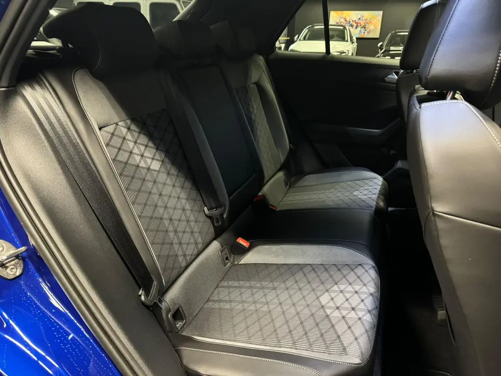 Volkswagen T-Roc 1.5 TSI R-Line Blackstyle|Pano|Camera|Navi| uit 2024, foto 20