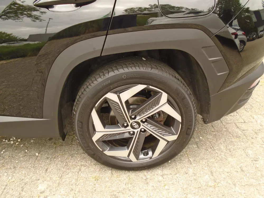 Hyundai TUCSON 1.6 T-GDI HEV Premium Sky uit 2023, foto 2