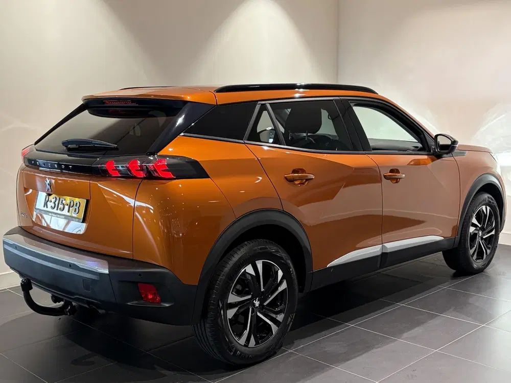 Peugeot 2008 PureTech 100 Allure Pack l Trekhaak l Navi uit 2022, foto 5