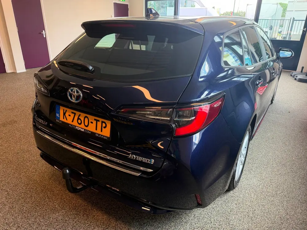 Toyota Corolla 1.8 Hybrid Active Automaat uit 2021, foto 4