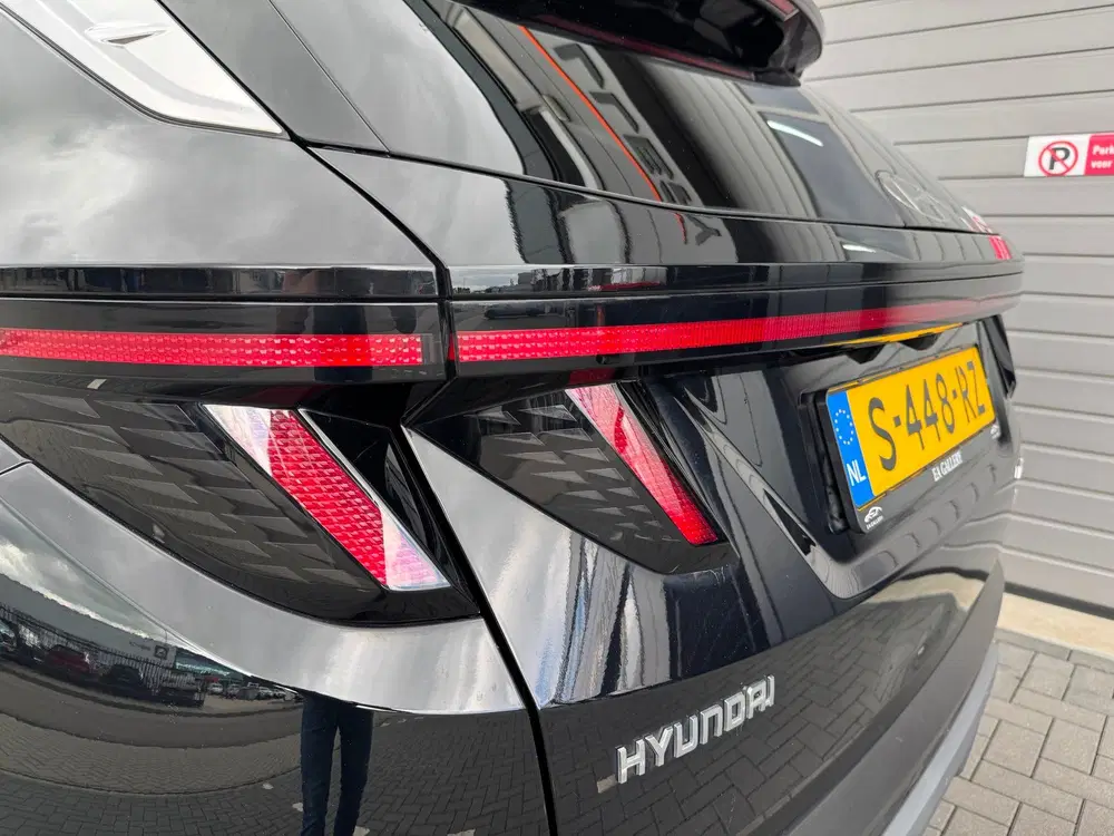 Hyundai TUCSON 1.6 T-GDI HEV Premium Sky BOMVOL uit 2023, foto 14