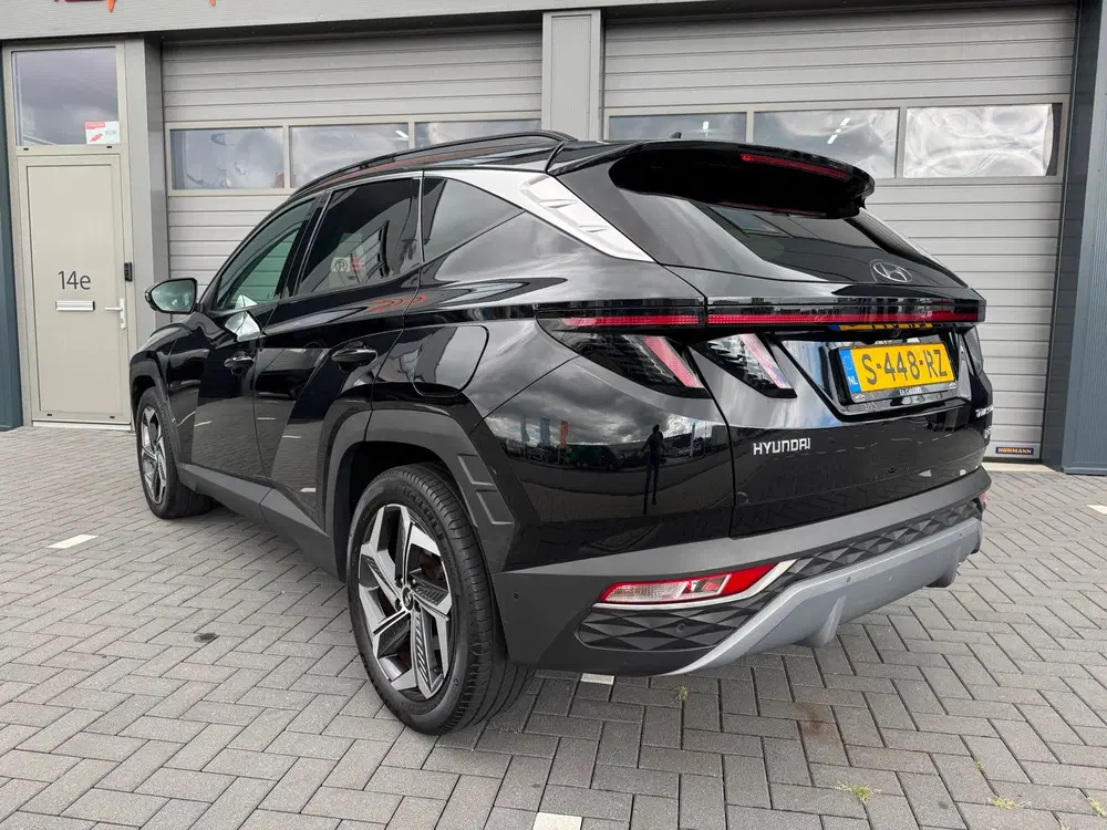 Hyundai TUCSON 1.6 T-GDI HEV Premium Sky BOMVOL uit 2023, foto 2