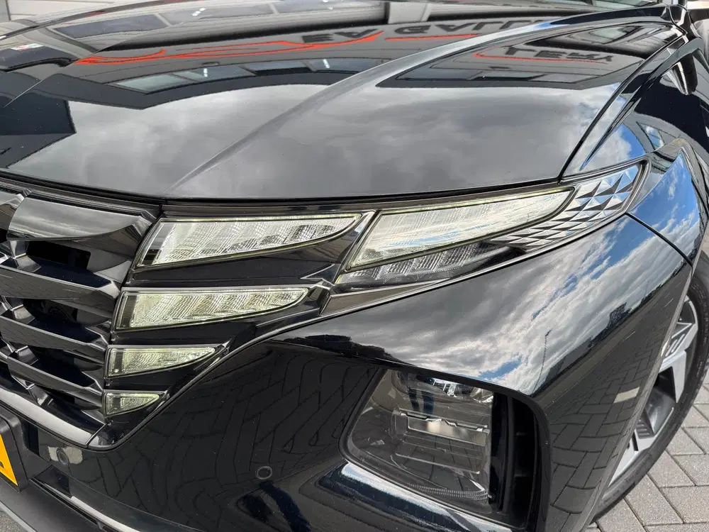 Hyundai TUCSON 1.6 T-GDI HEV Premium Sky BOMVOL uit 2023, foto 7