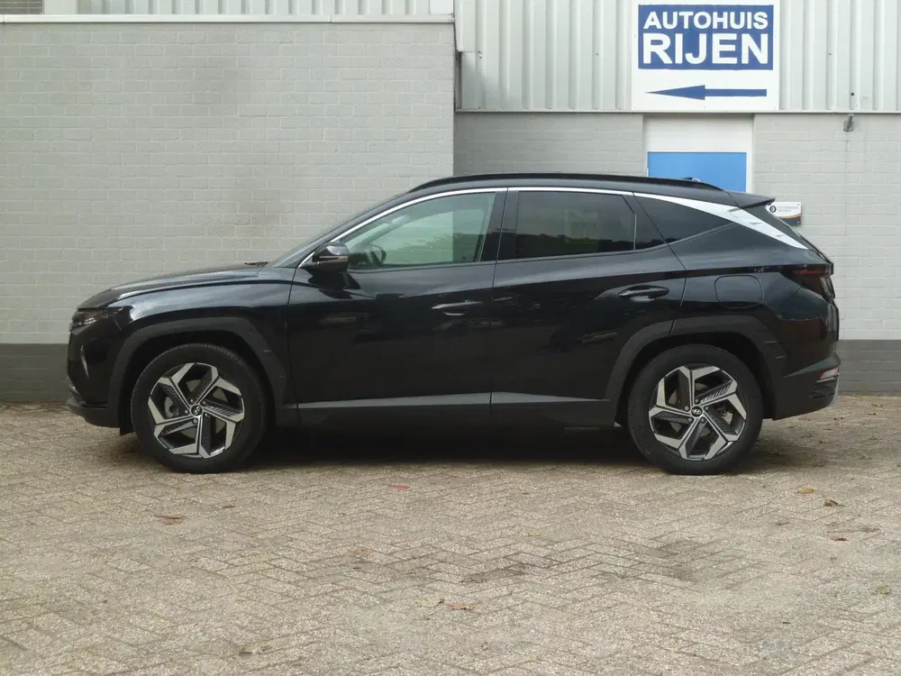 Hyundai TUCSON 1.6 T-GDI PHEV 4WD uit 2022, foto 6